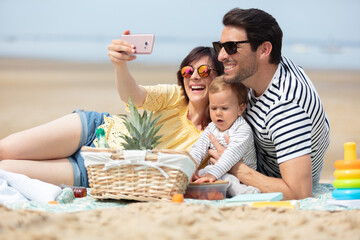 happy family spending good time at the beach together