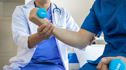 Professional therapist stretching Patients with muscular disease, rehabilitation and treatment of physiological disorders according to the concept of a physiotherapist.