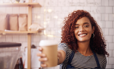 Portrait of happy woman, waitress service and coffee cup in cafeteria, restaurant shop and small business. Female barista, server and giving cappuccino, drinks and order with smile in food industry