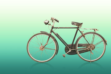 side view old and rust black and silver bicycle on gradient green background, object, decor, transport, copy space