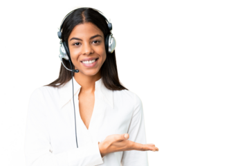 Telemarketer African American woman working with a headset over isolated chroma key background presenting an idea while looking smiling towards