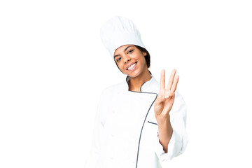 Young African American chef over isolated chroma key background happy and counting three with fingers