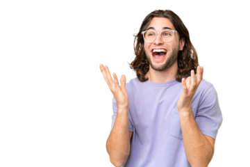 Young handsome man over isolated background with surprise facial expression