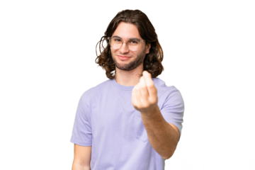 Young handsome man over isolated background making money gesture