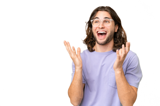 Young handsome man over isolated background with surprise facial expression