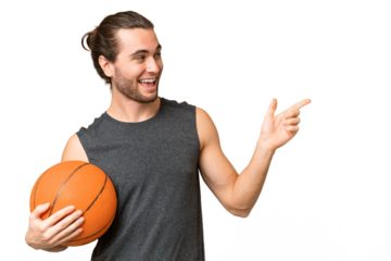 Young basketball player man over isolated background pointing finger to the side and presenting a product