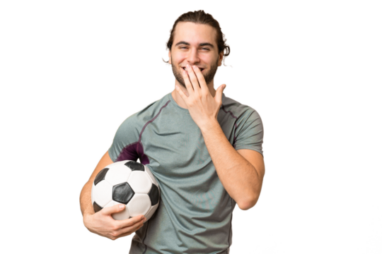 Young handsome football player man over isolated background happy and smiling covering mouth with hand