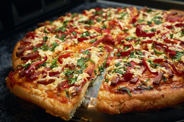 Sliced pizza close-up. Fast food.