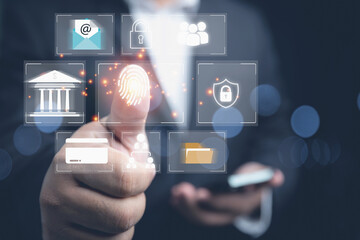 Technology system biometrics fingerprint scanner for login security. Businessman scanning finger login to personal data private by scan fingerprint. Cyber security systems.