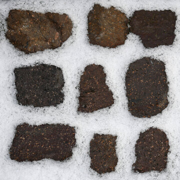 Snow filling all gaps of stones ofw a walkway