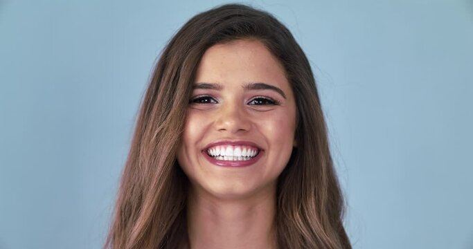Happy, laughing and smile with face of woman in studio for funny, beauty salon and natural makeup. Happiness, cosmetics and comedy with portrait of female model isolated on gray background for mockup