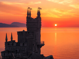 Fototapeta premium Swallow nest castle at the sunrise