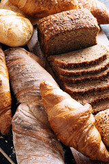 vibrant and appetizing variety of baked goods created by the skilled hands of bakers. Gorgeous bread rolls, perfectly golden croissants, fresh and fragrant baguettes are presented in all their glory.