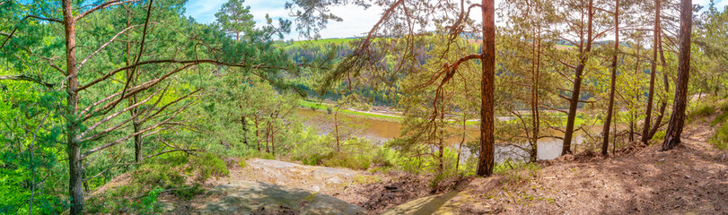 Panoramic with magical enchanted fairytale forest and Elbe river bird view at sandstone rocks at the hiking trail in the national park Saxon Switzerland, Bad Schandau, Saxony, Germany.