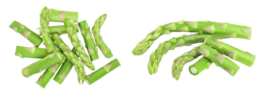 Fresh sprouts of asparagus isolated on white background. Top view. Flat lay