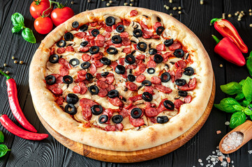 Big and tasty pizza with different types of meat