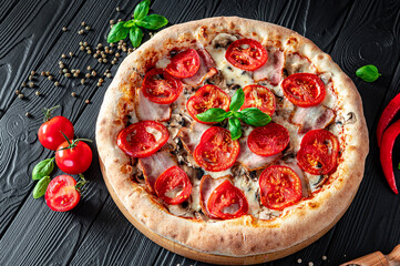 Tasty and big pizza with different types of meat