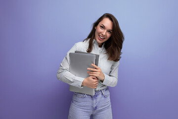 smart successful brunette young lady freelancing with hair below her shoulders with documents and a...