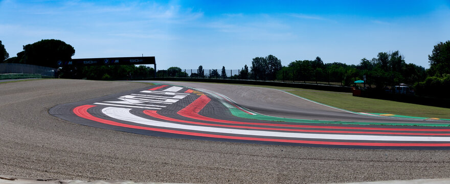 Double turn of motor sport asphalt race track, Imola circuit Italy, Acque minerali turn without car