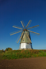 windmill dutch type against blue sky