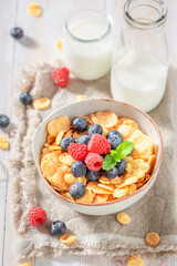 Tasty and sweet cornflakes made of raspberries and blueberries.