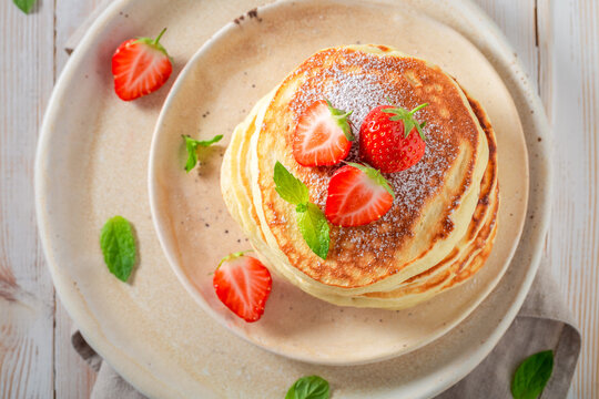 Delicious and hot american pancakes for summer breakfast.