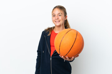 Little caucasian girl isolated on white background playing basketball