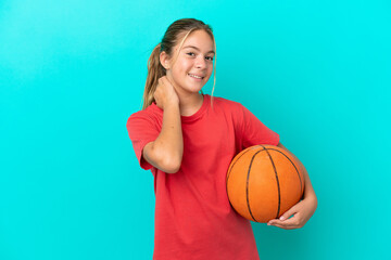 Little caucasian girl playing basketball isolated on blue background laughing - Powered by Adobe