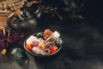 Fototapeta na wymiar Healing Crystals and Mineral Stones in a Bowl