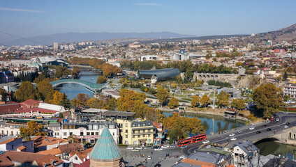 Fototapeta na wymiar Panoramic view on Tbilisi and Kura river with Bridge of Piece, Georgia