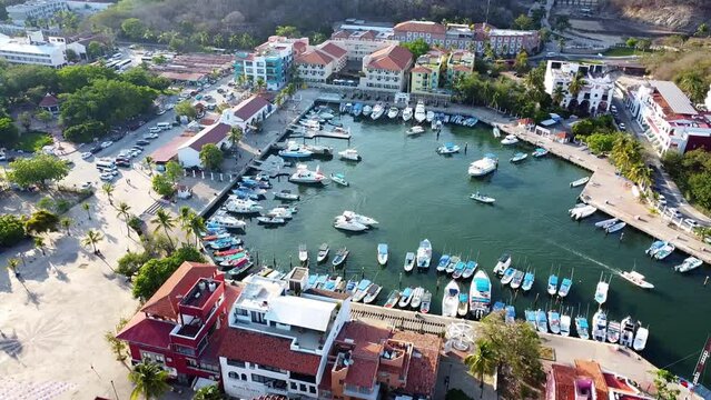 4k aerial latin boat pier in mexico oaxaca downtown huatulco cancun caribbean pacific sea summer day vacation in america drone footage
