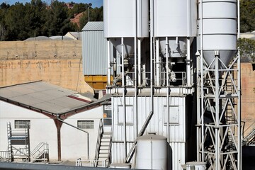 silo cement tank industry storage in factory next to shed and interior yard
