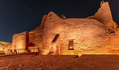 Diriyah old town walls illuminated at night, Riyadh, Saudi Arabia