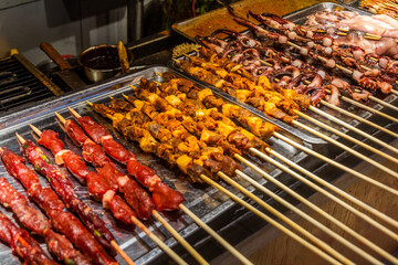 Street food skewers in the old town of Lijiang, Yunnan province, China