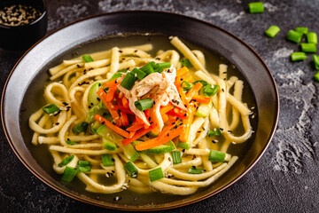 Traditional Korean chicken soup with homemade noodles