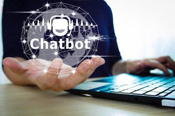 Woman holding Chatbot virtual icon and graphic with laptop, intelligence Ai,Chat with AI Artificial Intelligence, Futuristic technology, robot in online system