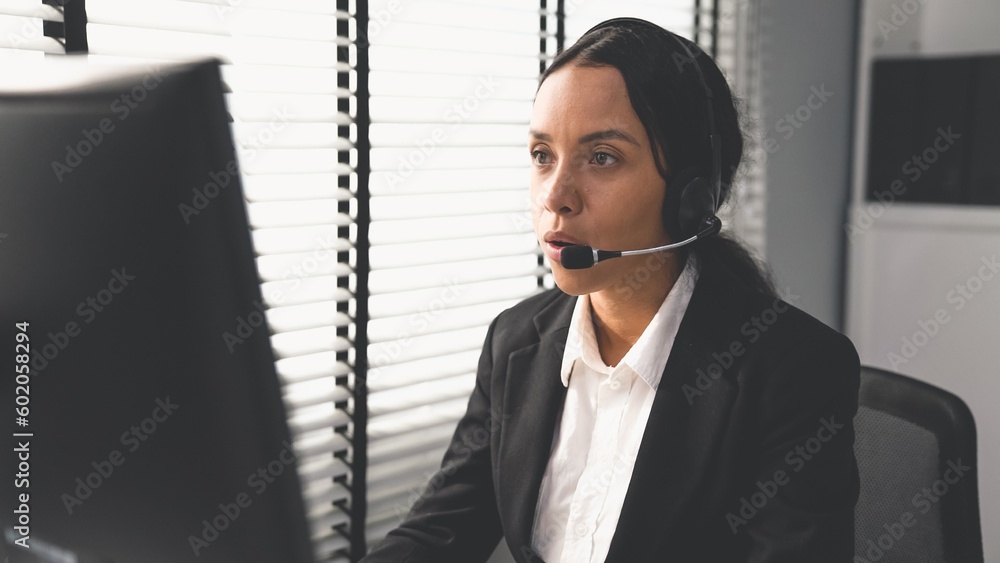Aufkleber competent female operator working on computer and talking with clients. concept relevant to both cal