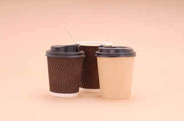 Disposable paper container for coffee.