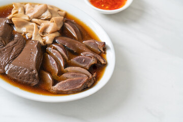 stewed duck offal in brown soup