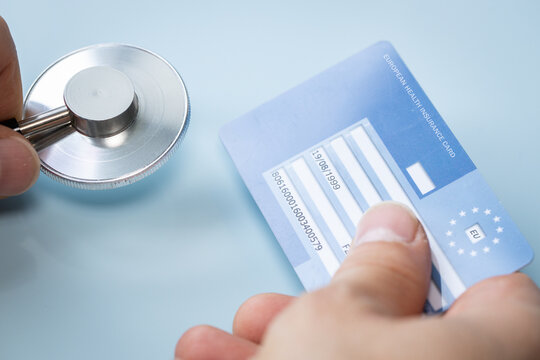 European health insurance card, doctor's office, Concept, EU document confirming the right to treatment outside of your own country, Travel insurance for Europeans traveling to EU and EFTA countries
