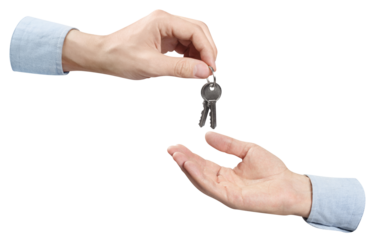 Two hands sharing house keys, cut out