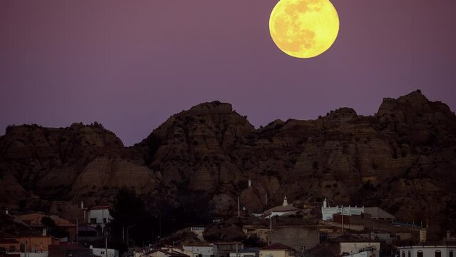 full moon timelapse of city