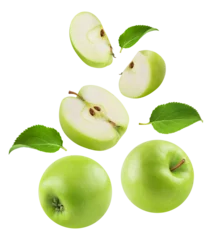 Poster Apples isolated. Levitation of ripe green apples, apple halves and slices on a transparent background. © Денис Петровских