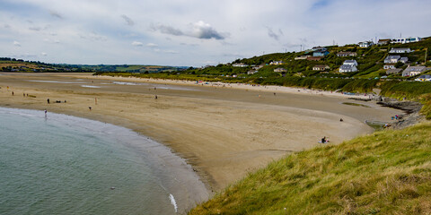View of the famous Irish beach of Inchydoney. The Irish coast of the Atlantic Ocean on a sunny...