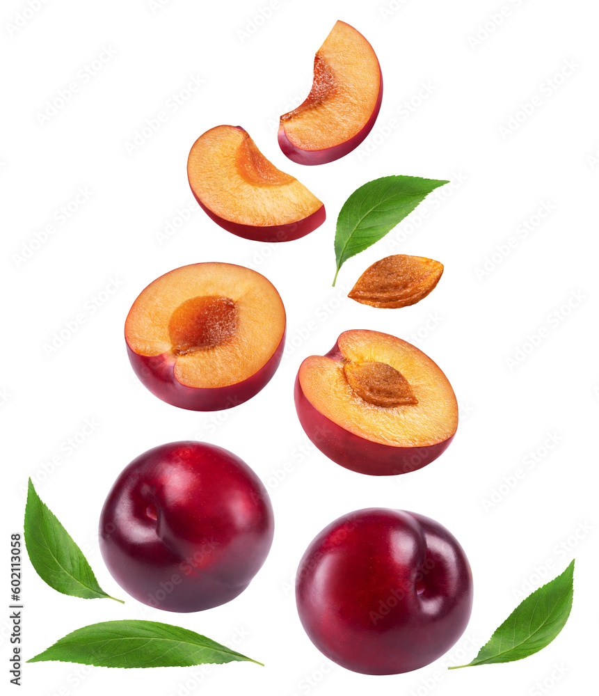 Poster plum isolated. ripe red plum, fruit halves and slices on a white background. fruit levitation.