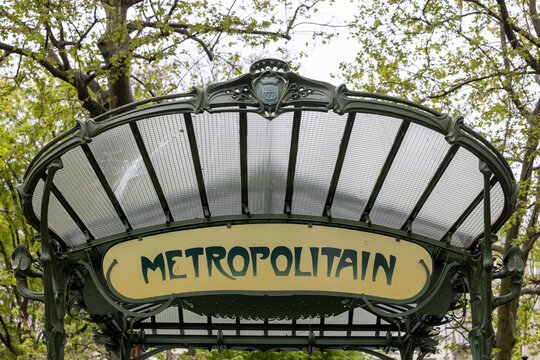 Paris, France April 29th 2023 Metro station entrance at Abbesses station near Montmartre. Vintage subway entrance designed by Hector Guimard