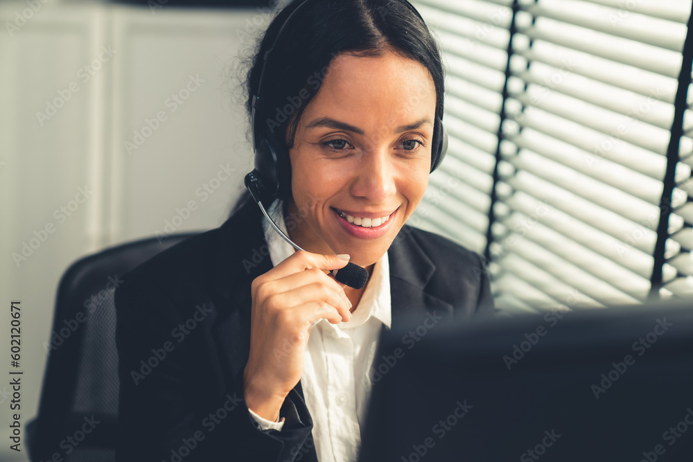 Aufkleber Competent female operator working on computer and talking with clients. Concept relevant to both call centers and customer service offices.