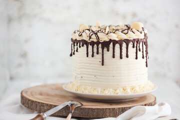 Close-up of a chocolate layer cake with buttercream icing