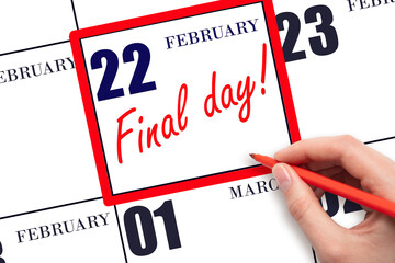 Hand writing text FINAL DAY on calendar date February 22.  A reminder of the last day. Deadline....