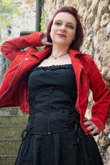 woman in rockabilly style in spring in the city